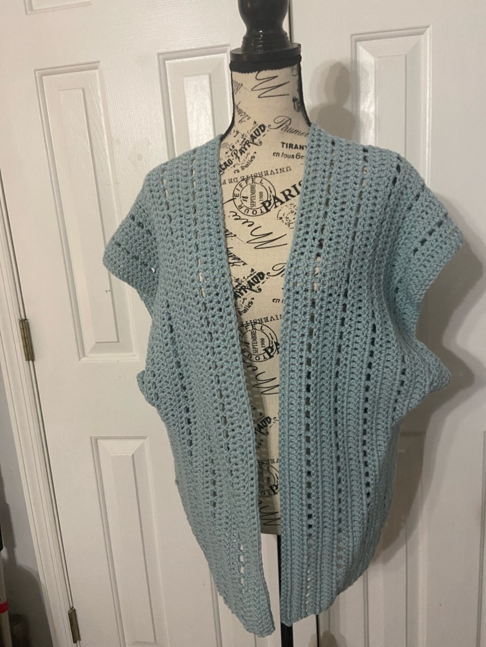 Crocheted sleeveless cardigan